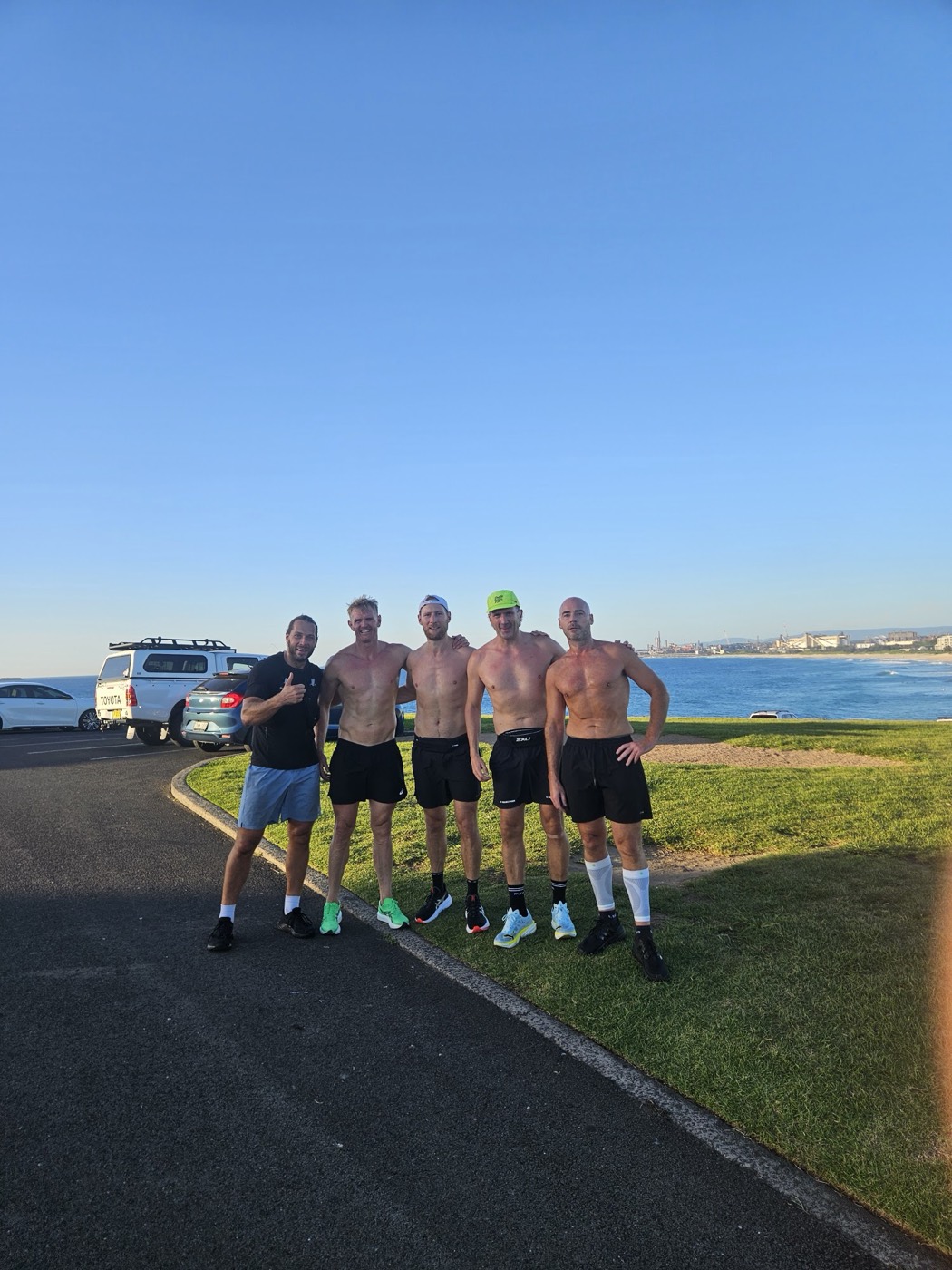 JL with running mates by the water