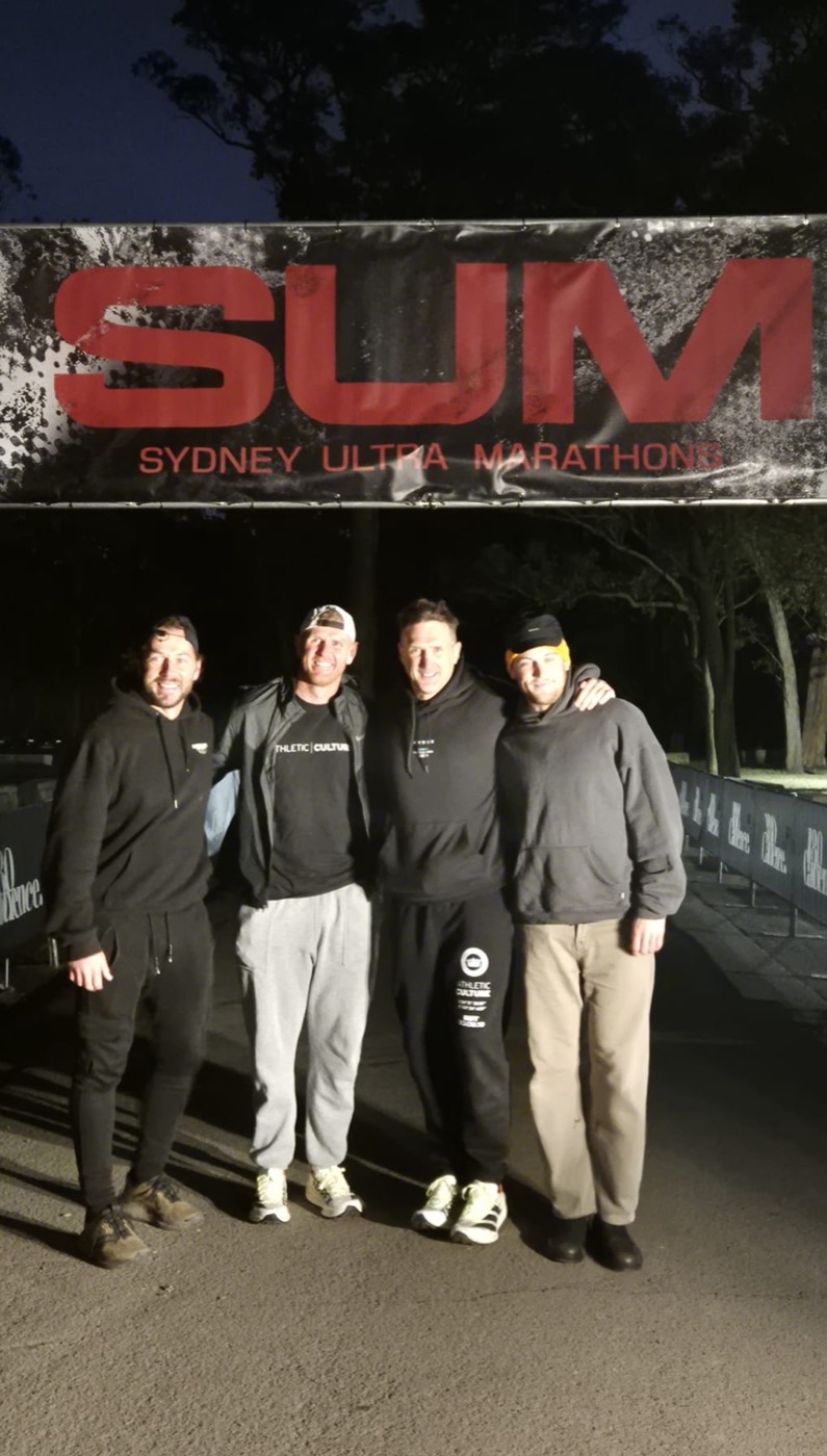 JL and his support crew under the Sydney Ultra Marathon finish arch