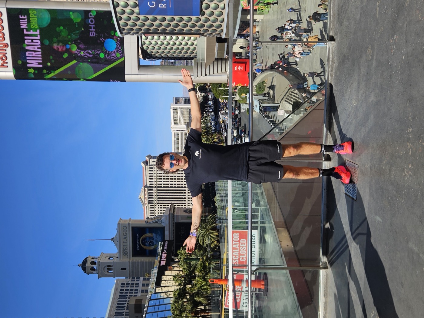 JL on the Las Vegas Strip with arms outstretched